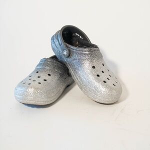 CROCS women’s  Sparkling Silver Slippers